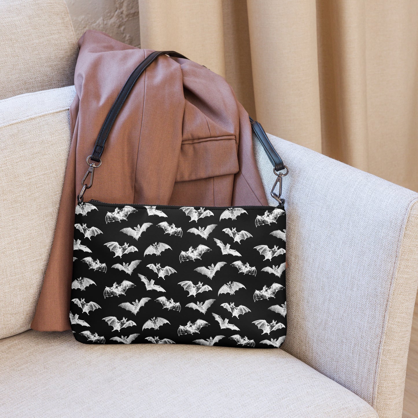 batty all over printed crossbody bag - front